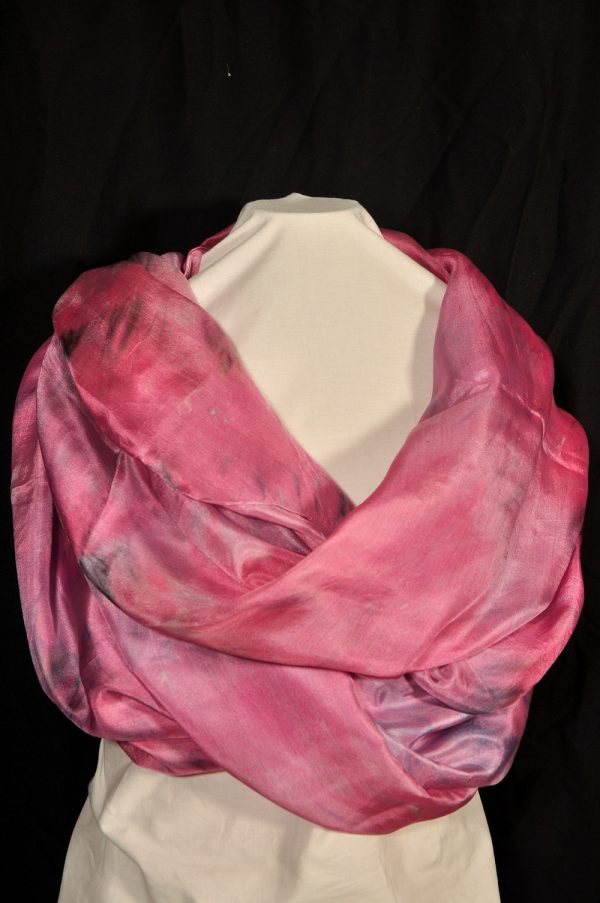 dark pink with purple highlights light silk shawls wrapped around a mannequin